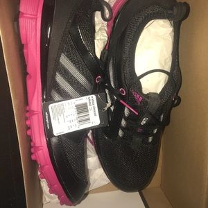 Brand new black and pink adidas golf shoes size 9.